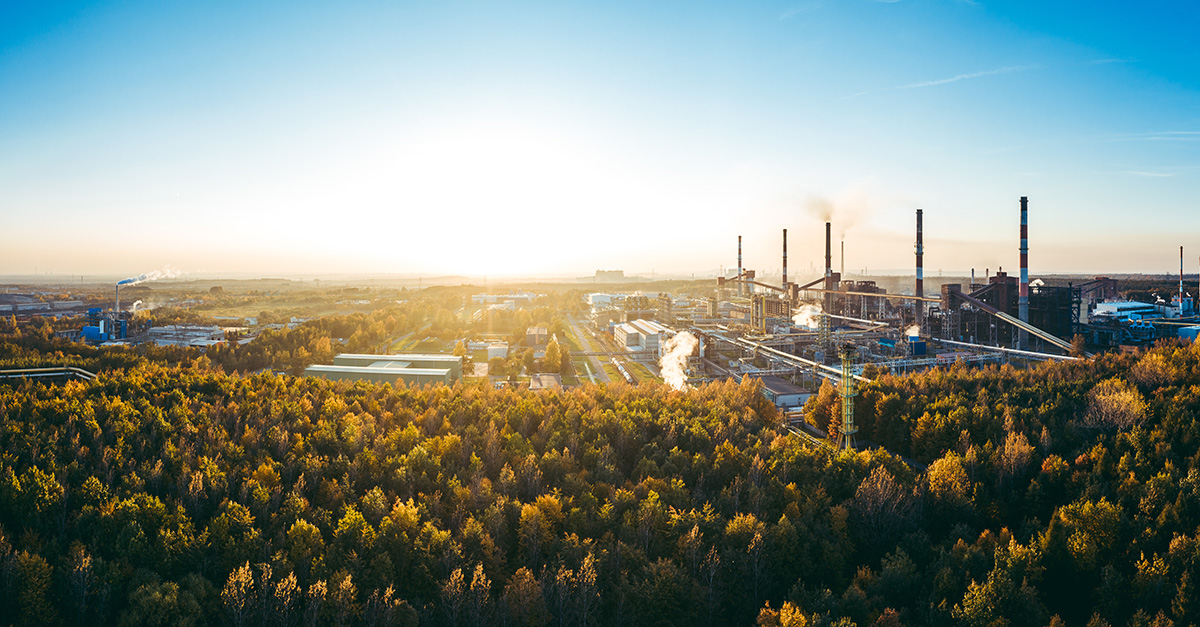 industrial landscape with heavy pollution produced by a large factory